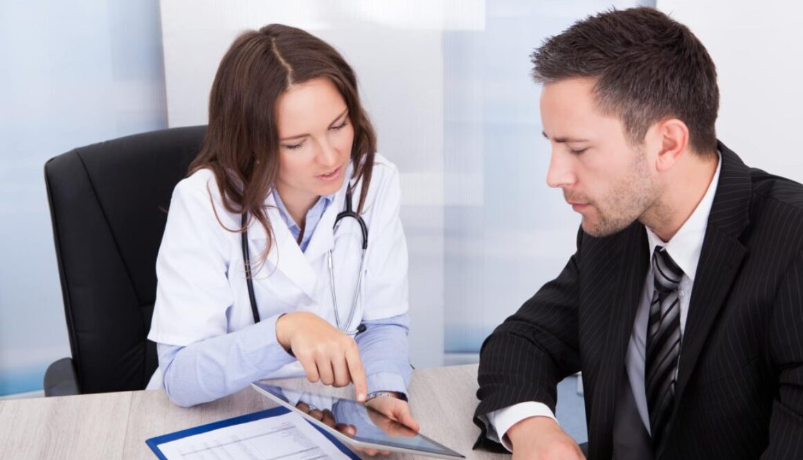 Female Doctor Showing Digital Tablet