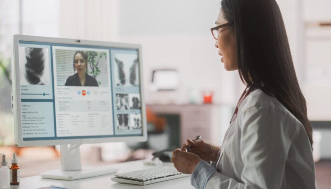 Hospital Medical Doctor Office: Portrait of Professional Female Physician Working on Desktop Computer, Talking to a Patient on a Internet Video Call Consultations, Writing Digital Prescriptions